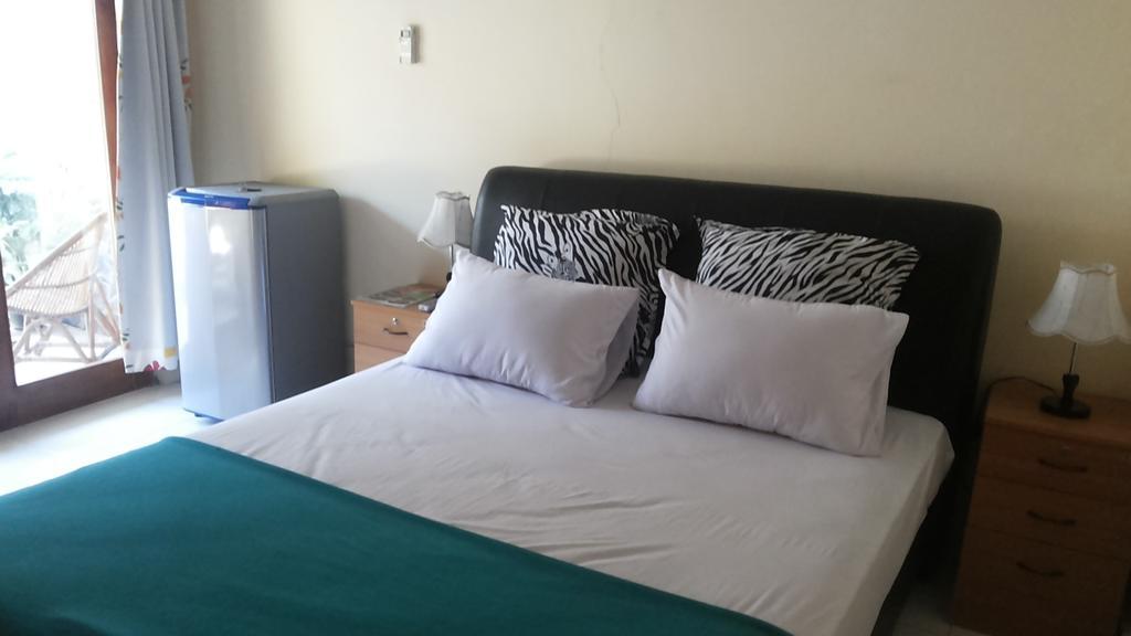 Beto Guesthouse Kalasan Pokoj fotografie